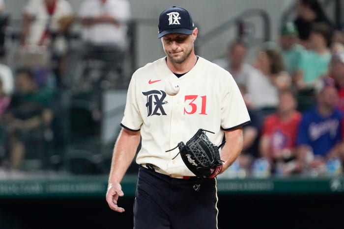 Sep 1, 2023; Arlington, Texas, USA; Texas Rangers starting pitcher Max Scherzer (31) reacts after giving up a single during the fourth inning against the Minnesota Twins at Globe Life Field. Mandatory Credit: Raymond Carlin III-USA TODAY Sports